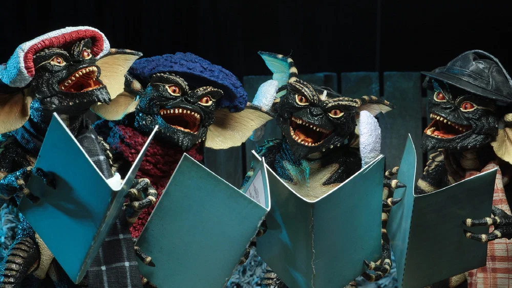 Gremlins singing Christmas Carols